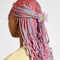 model wearing shimmer lilac flower hair claw with yellow/lime center