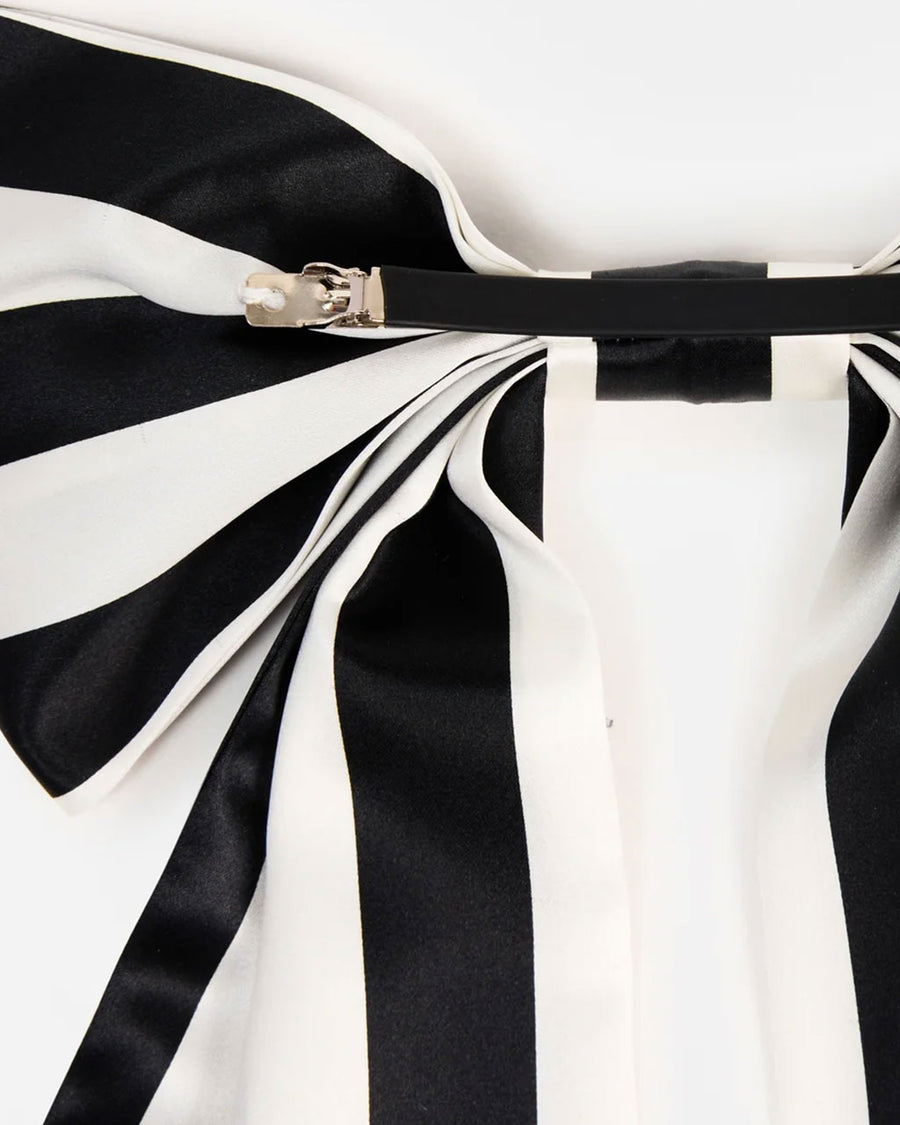 up close of back of black and white stripes oversized hair bow clip