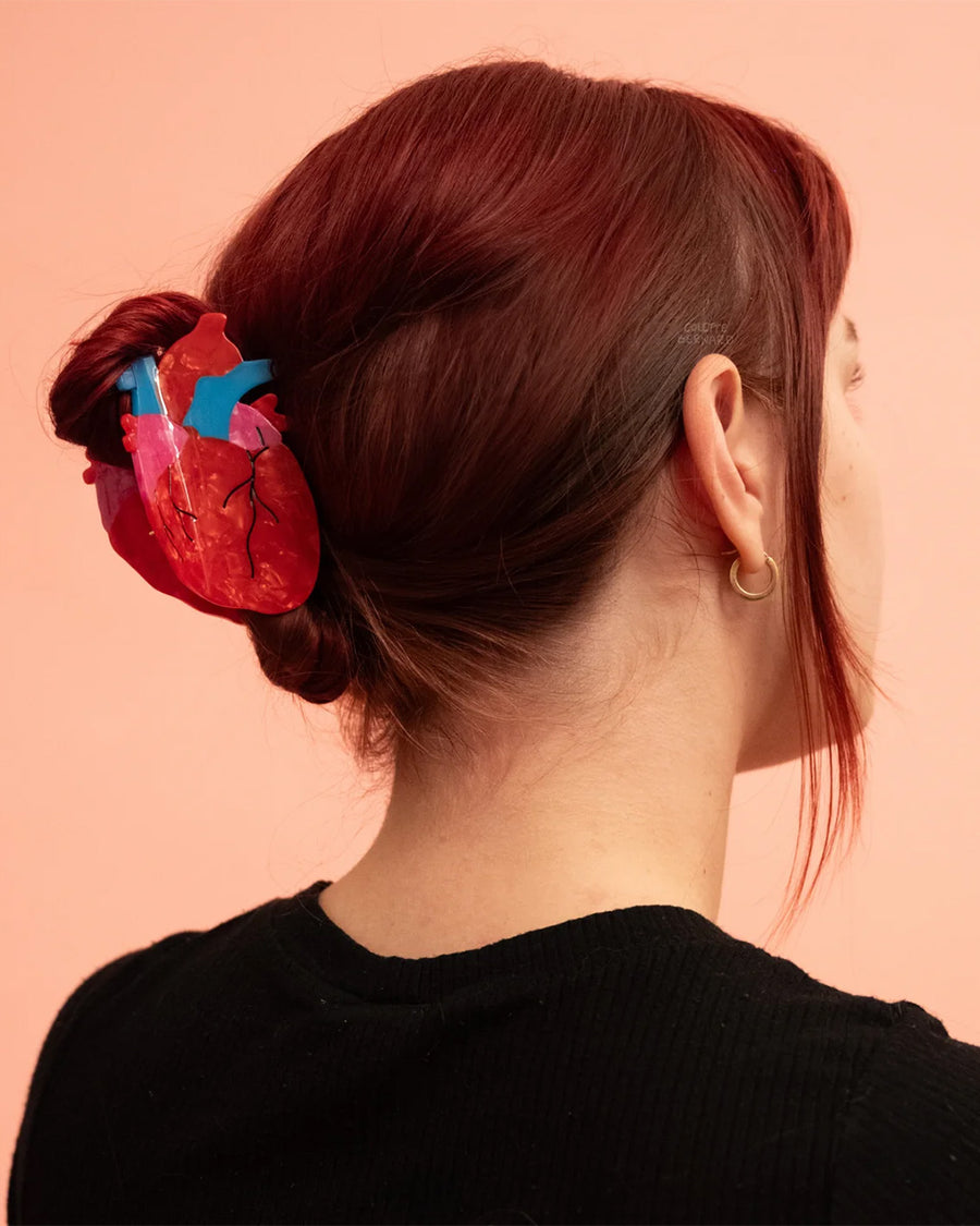 model wearing anatomical heart hair claw