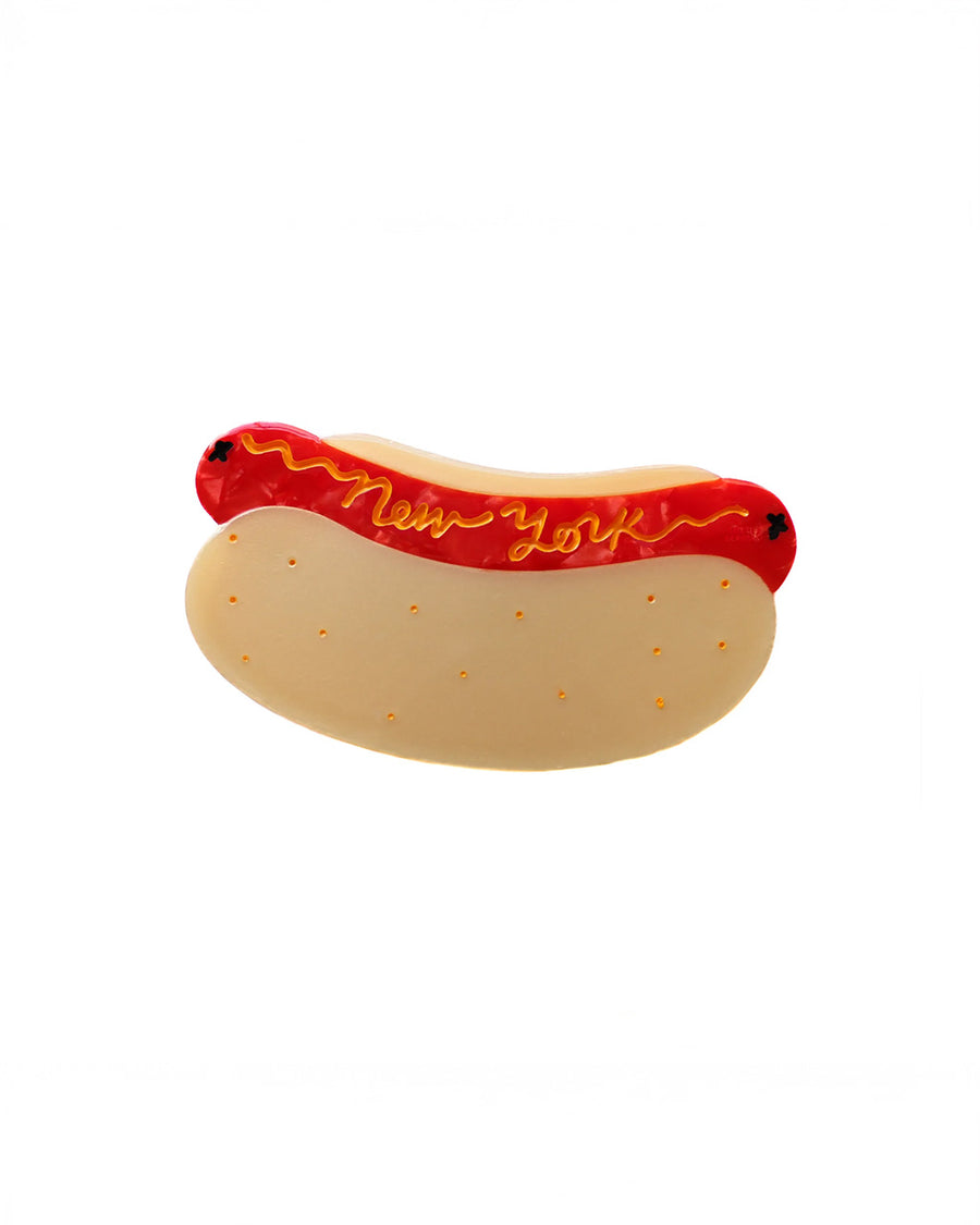 hot dog hair clip with 'new york' written in mustard