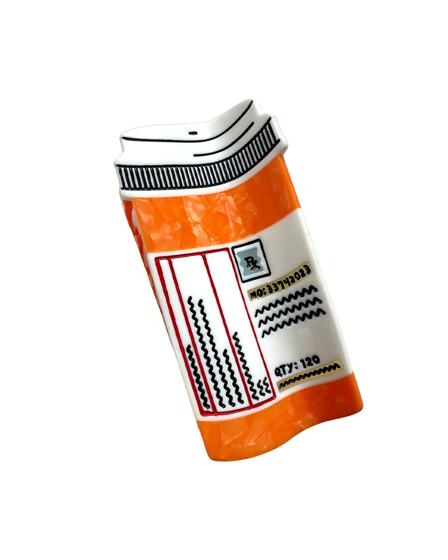 orange prescription bottle hair claw