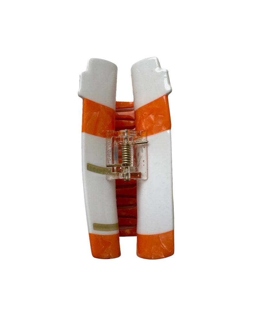 hinge on orange prescription bottle hair claw