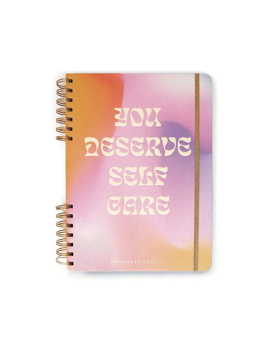 multi color wellness journal that says 'you deserve self care'