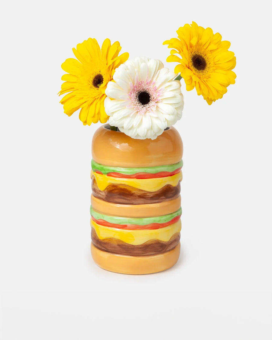 cheeseburger shaped vase with flowers inside