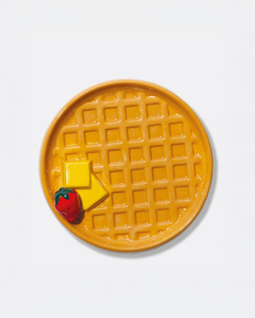 textured ceramic waffle trinket tray with butter and strawberry in the corner