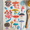 cream tea towel with colorful mushroom print