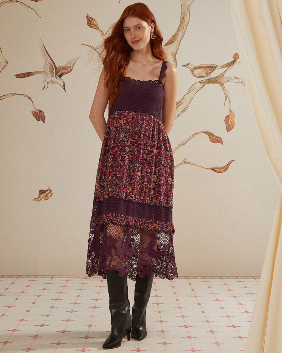 model wearing purple midi dress with crochet bodice and floral skirt with lace and crochet details