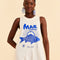 up close of model wearing cream cotton jumpsuit with blue 'mar da bahia' and fish graphic on front