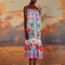 model wearing white maxi dress with abstract tropical print with parrots