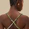 up close of back criss-cross straps with textured straps