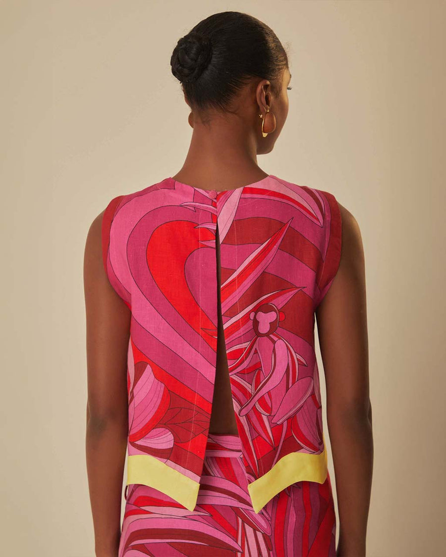 back slit on pink and red abstract floral tank with wavy yellow trim