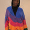 model wearing colorful wavy print oversized cardigan