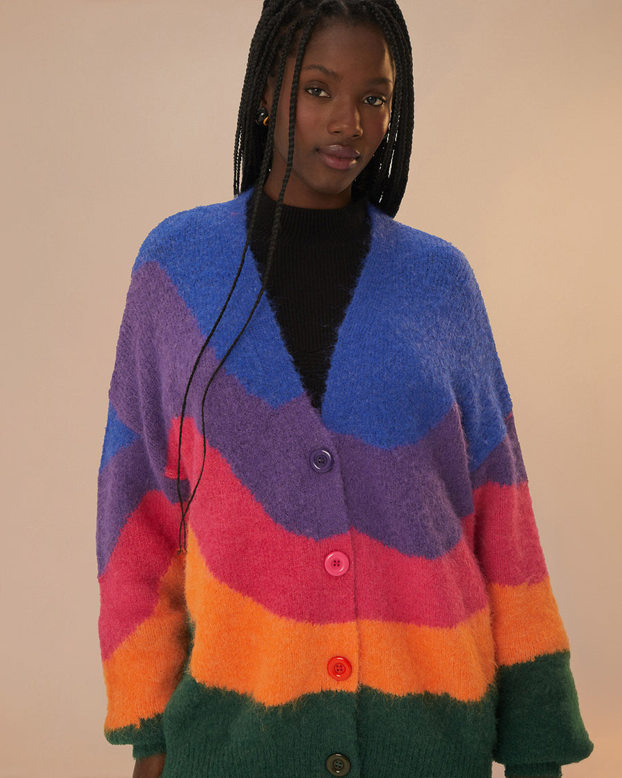 model wearing colorful wavy print oversized cardigan