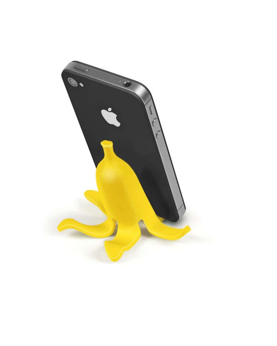 banana shaped phone holder holding up a black phone vertically