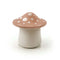 tan mushroom shaped utter storage container