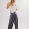 back view of model wearing washed black relaxed fit lounge pants with pockets