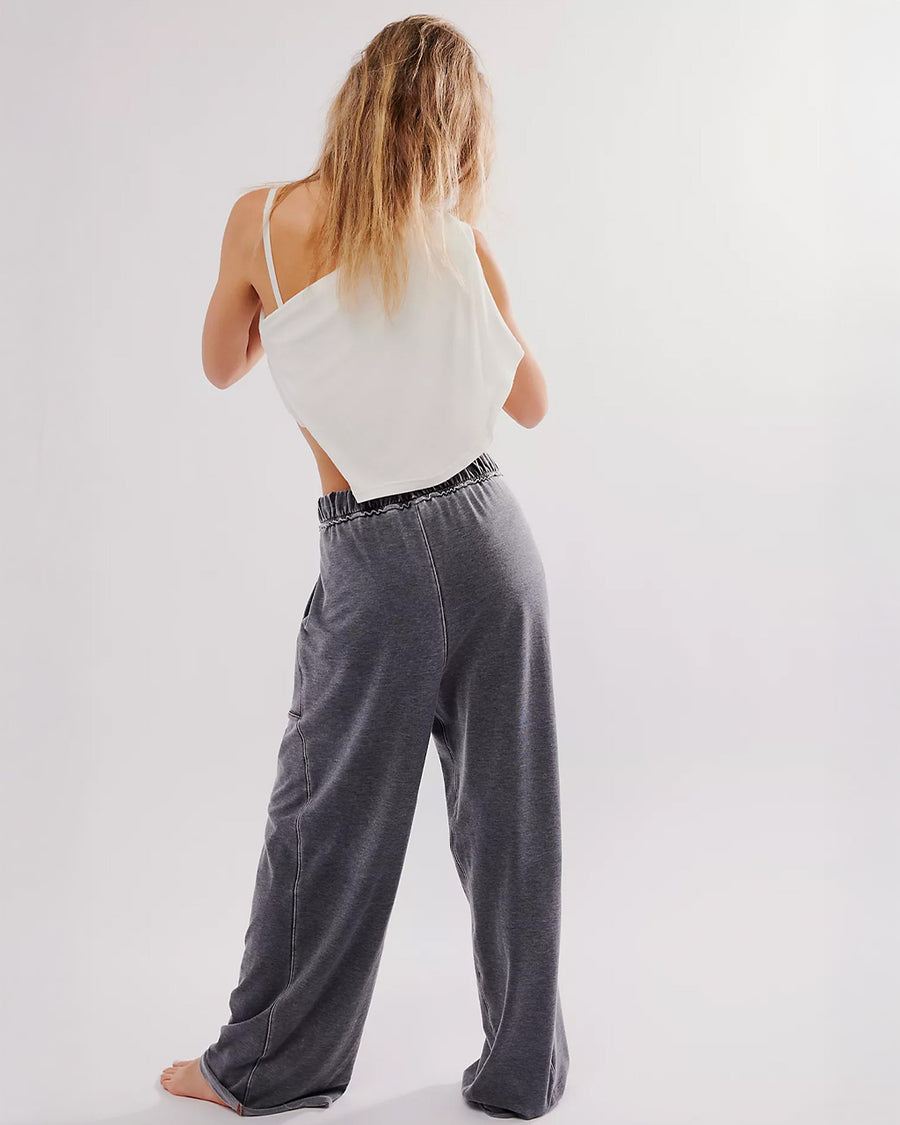 back view of model wearing washed black relaxed fit lounge pants with pockets