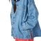 side view model wearing light denim oversized jacket with front patch pockets and button front