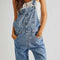 model wearing light acid watch slouchy overalls