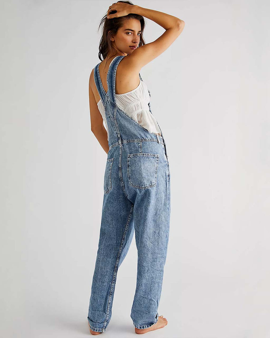 back view of model wearing light acid watch slouchy overalls