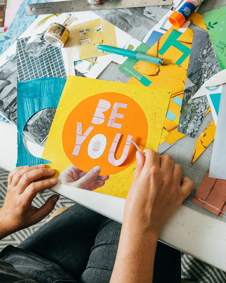 model creating a collage with various photos and letters