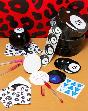 set of 6 round cards includes a sticker sheet of replies, 6 matching envelopes, and 6 stickers to seal them with, all contained within a charming and glossy round box that looks like an 8 ball on a table