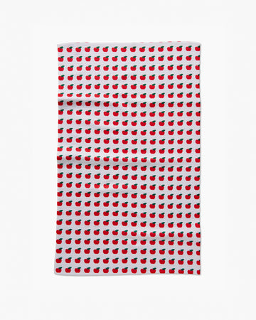 pink tea towel with all over apple print