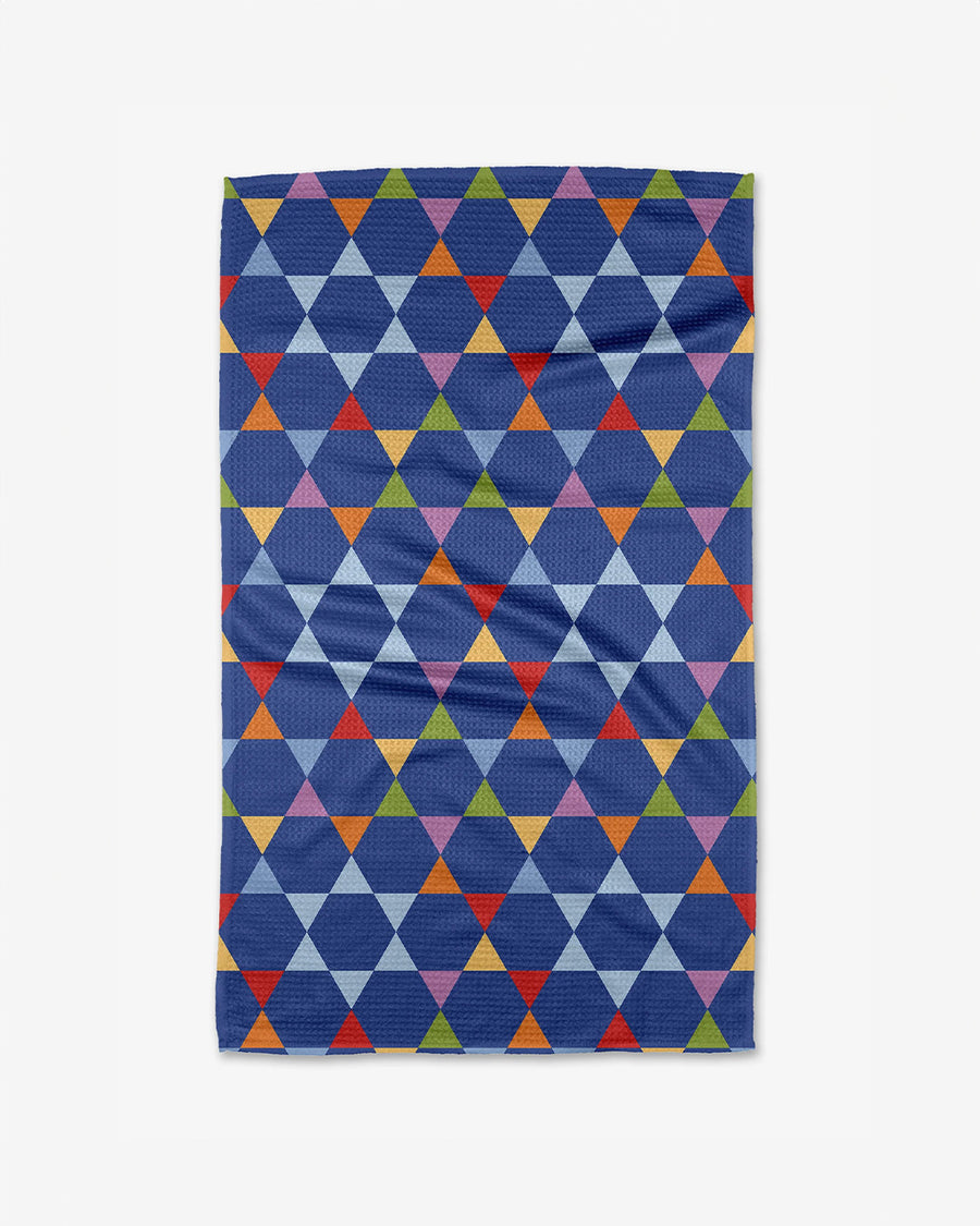 cobalt tea towel with all over colorful triangle print