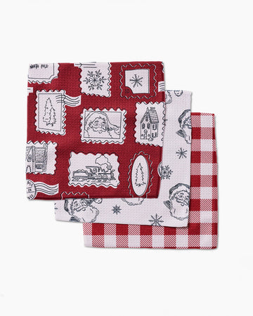 set of three dishcloths with santa faces and red and white plaid