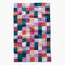 teal, purple, orange, and white checkered tea towel