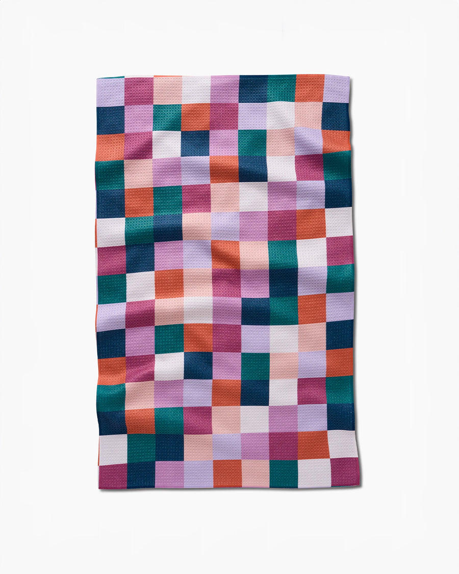 teal, purple, orange, and white checkered tea towel