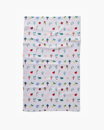 white tea towel with all over veggie print