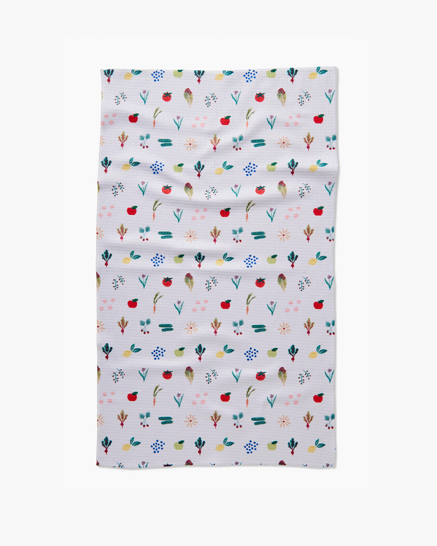 white tea towel with all over veggie print