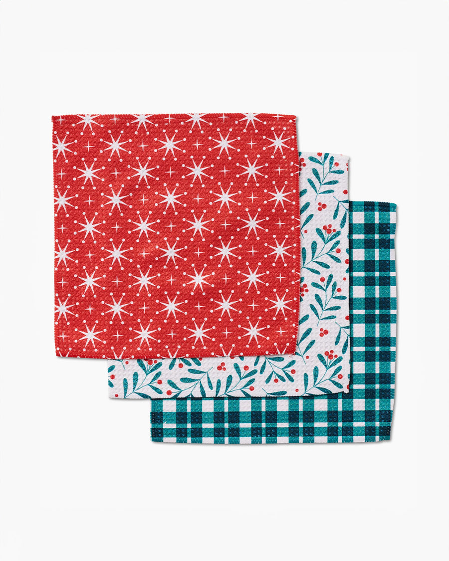 set of 3 dishcloths: red snowflake, white holly print, and teal plaid