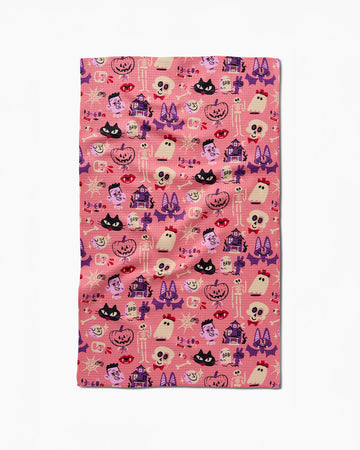 pink tea towel with halloween print