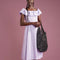 model holding black paper crochet bag