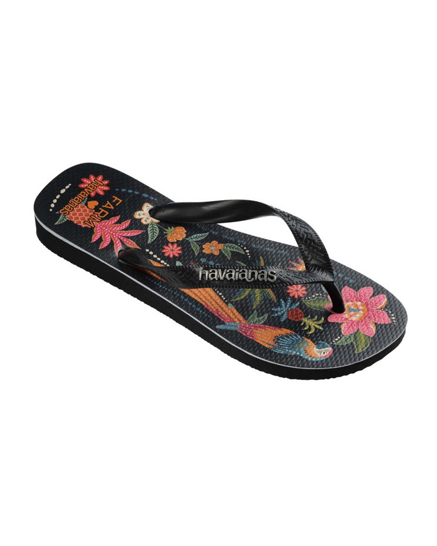 side view of black flip flops with colorful abstract floral and parrot print
