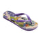 side view of tan flip flops with abstract parrot print