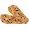 pair of tan flips flops with abstract spotted banana pattern