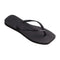 sideview of black square toe flip flop sandals