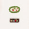 set of 2 hair clips: white strawberries with green border and brown veggies with white border