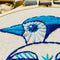 up close of blue folk blue jay embroidery kit