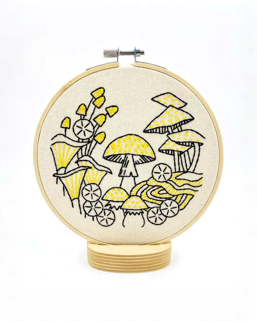 black and yellow mushroom embroidery kit on stand