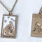 front and back view of gold strength tarot card necklace