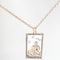 gold strength tarot card necklace