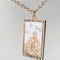 gold strength tarot card necklace