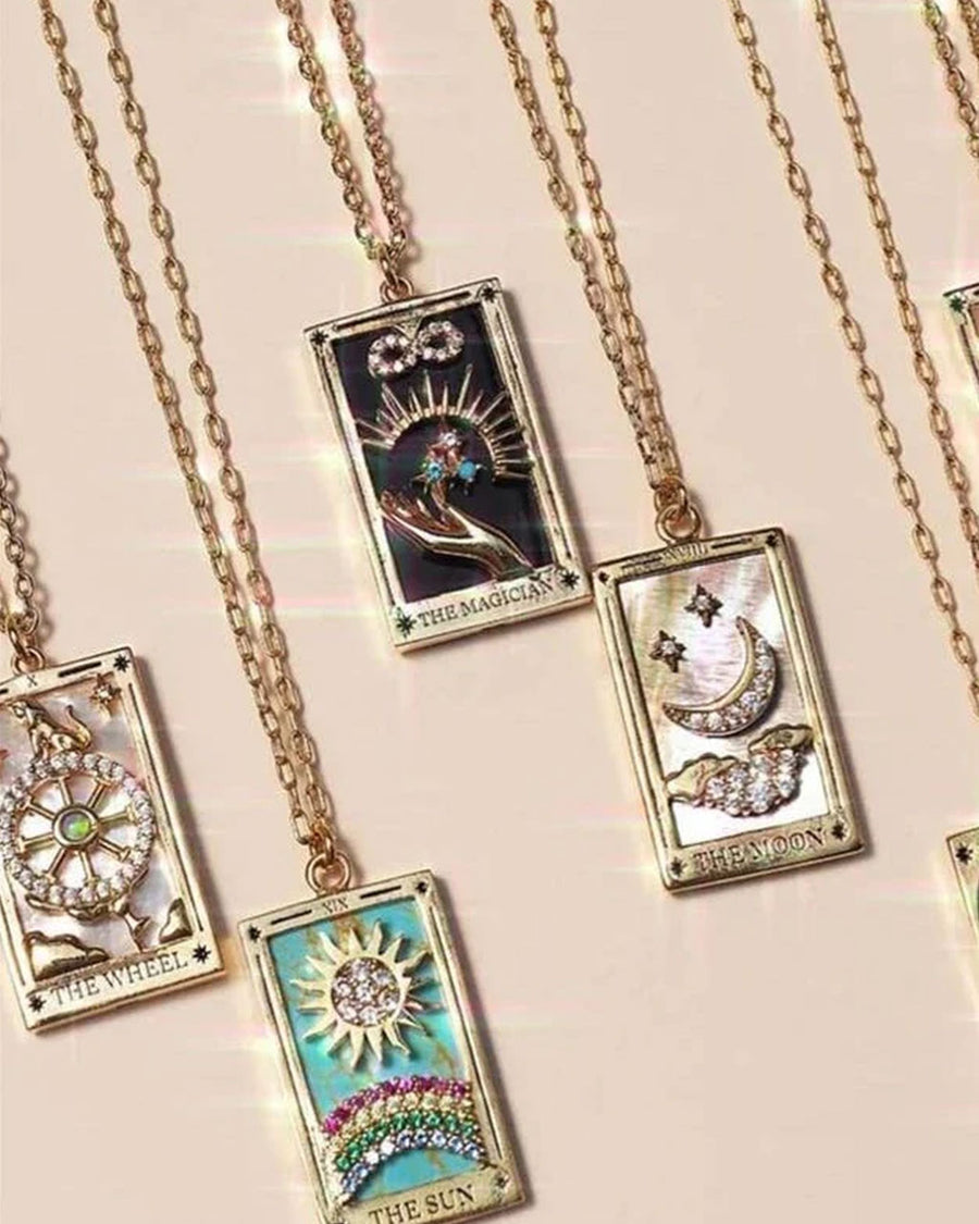 gold sun tarot card necklace with colorful crystals 