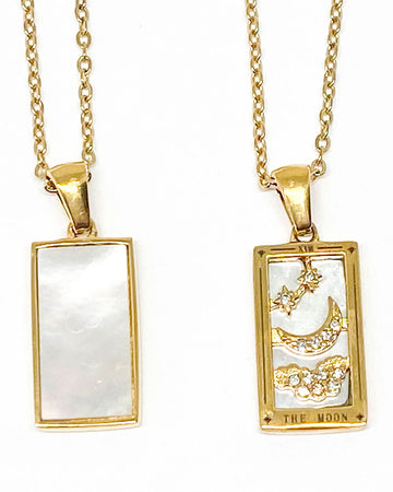 front and back view of gold 'the moon' tarot card necklace