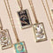 displayed the wheel of fortune gold tarot card necklace