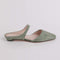 side view of sage suede kitten heel mule with strap and open back